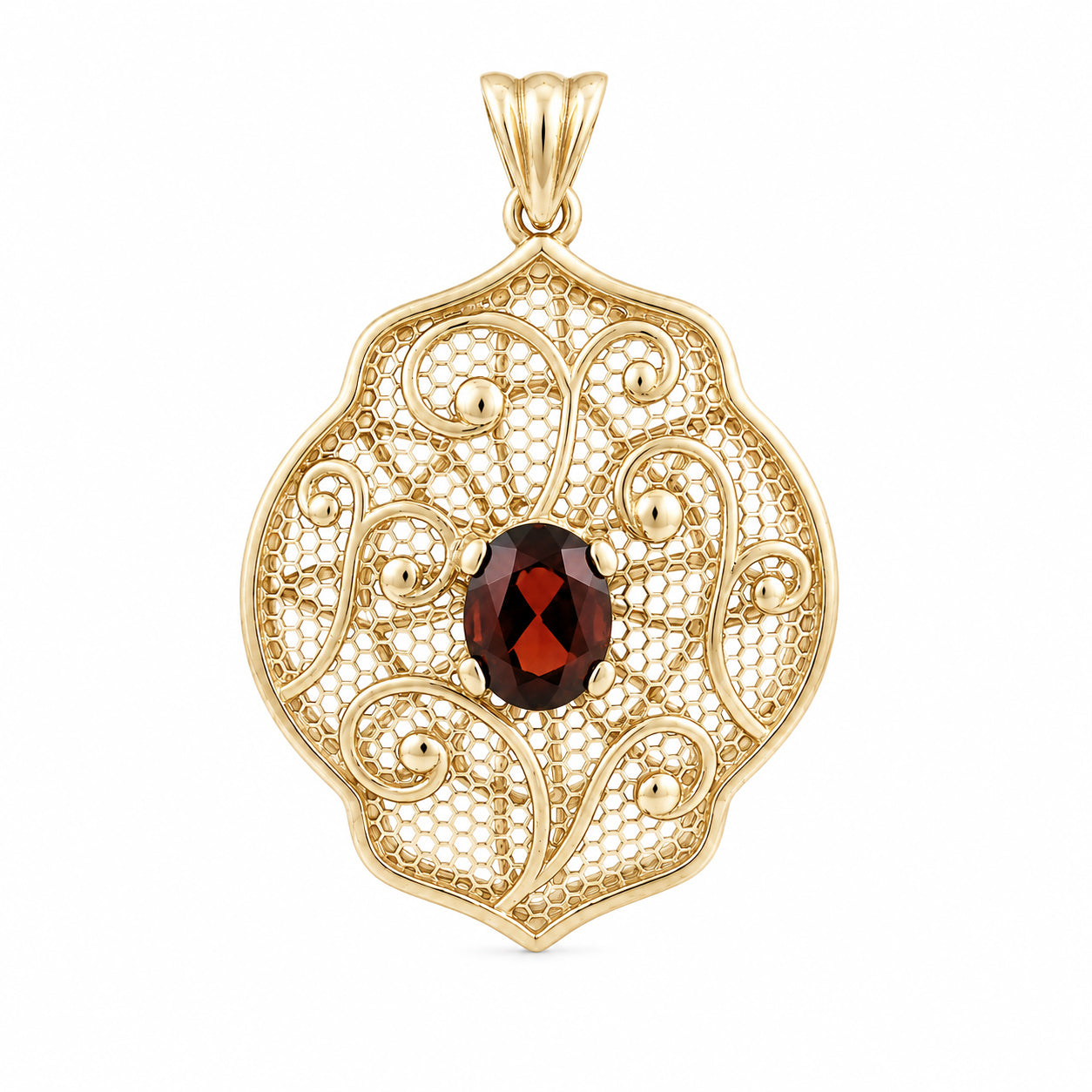 A gold filigree pendant featuring an oval dark red garnet gemstone at the center, set against a plain white background.