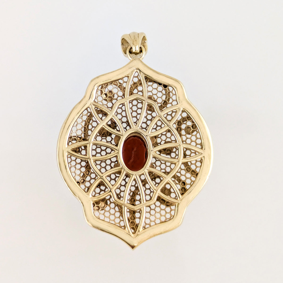 Natural Garnet Filigree Pendant with Ornate Scrollwork Design