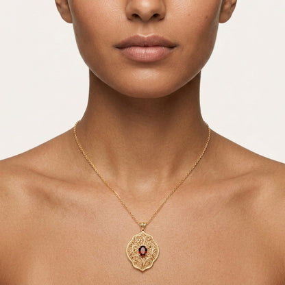 Natural Garnet Filigree Pendant with Ornate Scrollwork Design
