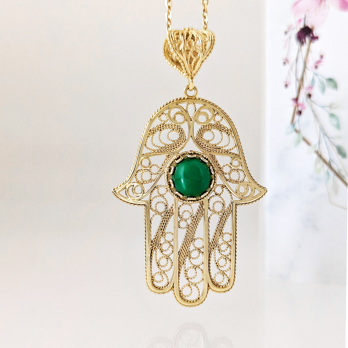 Green Crystal Hamsa Filigree Pendant with Ornate Openwork Design