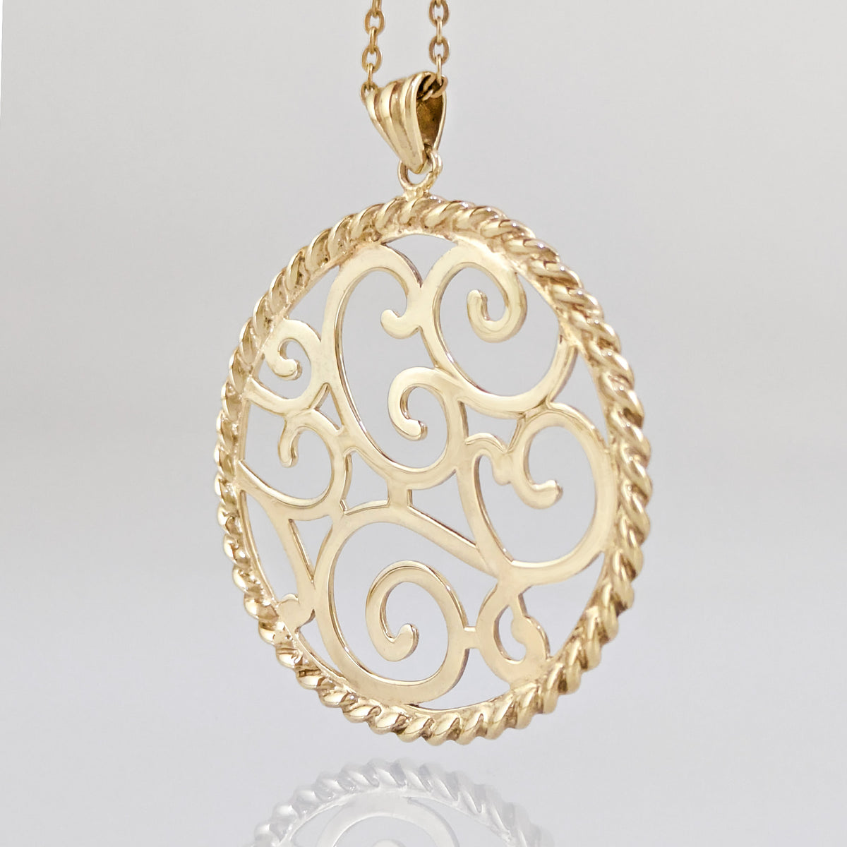 Ornate Scrollwork Round Pendant with Rope Border