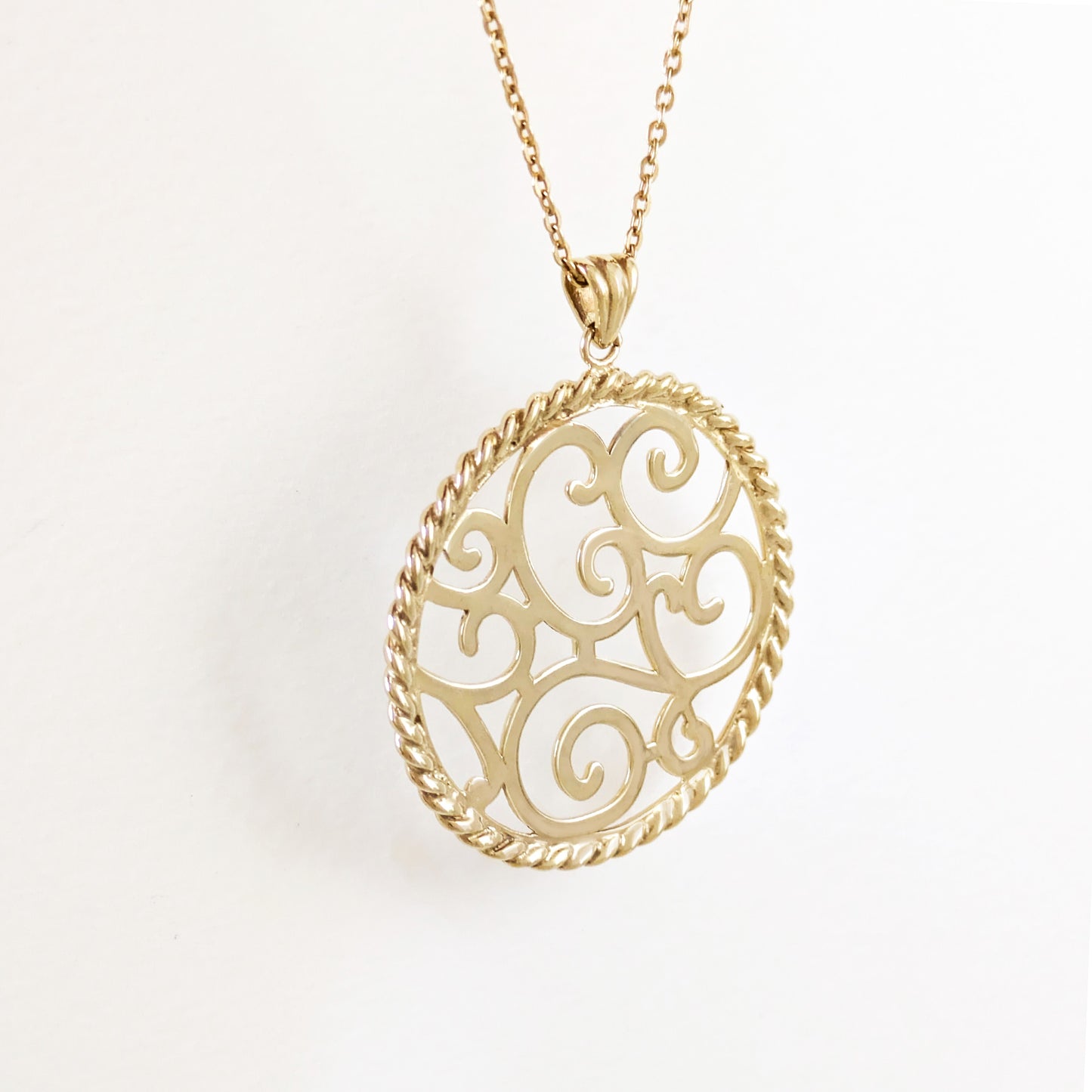 Ornate Scrollwork Round Pendant with Rope Border