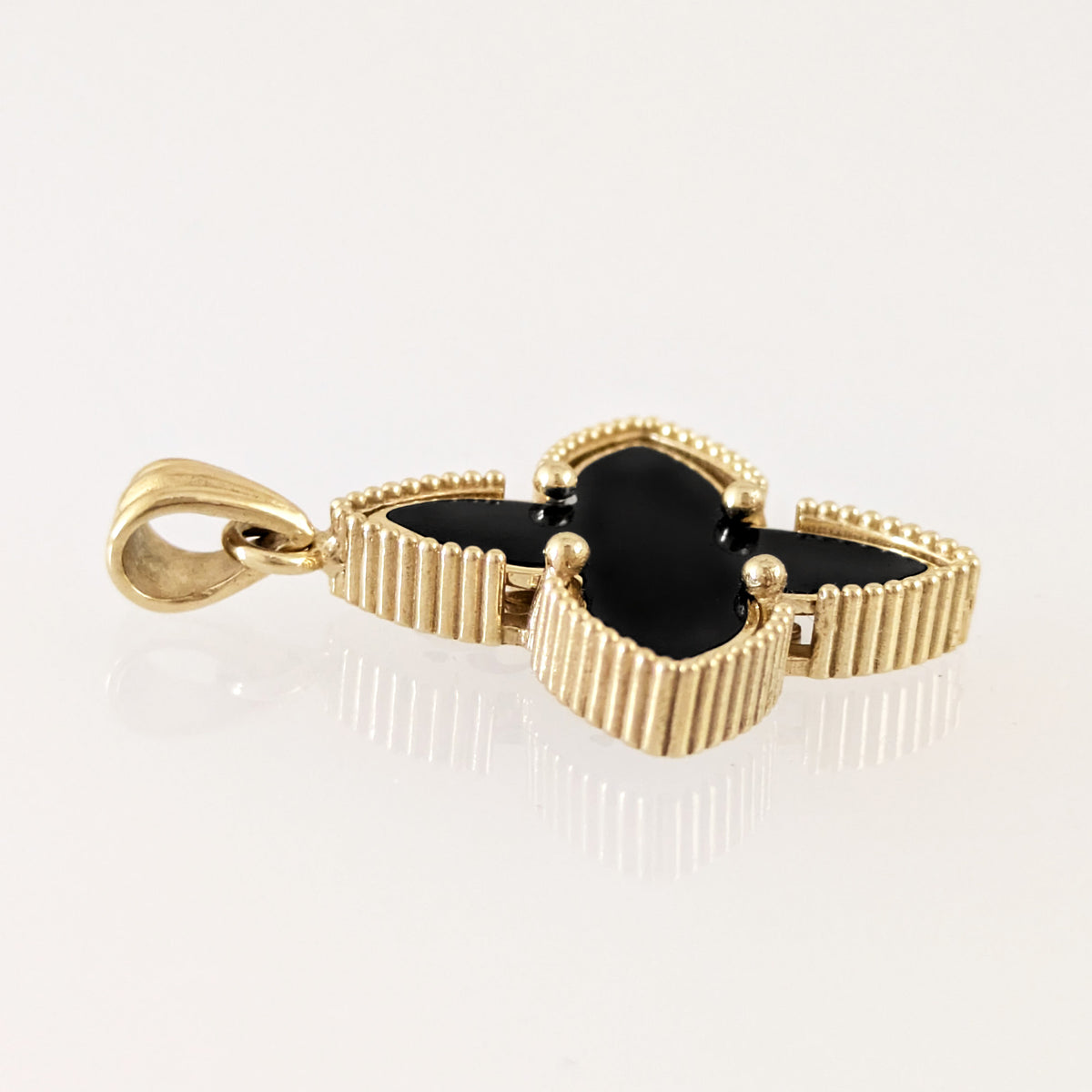 Black Four-Petal Pendant with Beaded Border