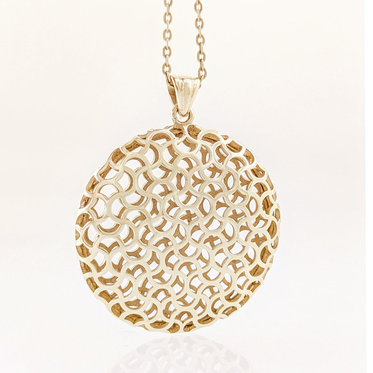 Ornate Round Openwork Pendant with Geometric Pattern
