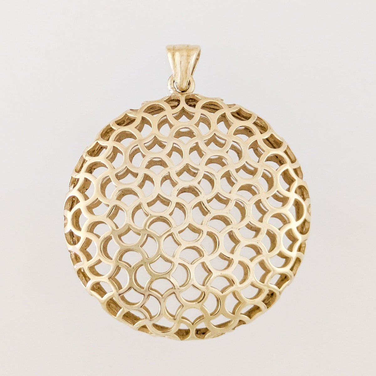 Ornate Round Openwork Pendant with Geometric Pattern