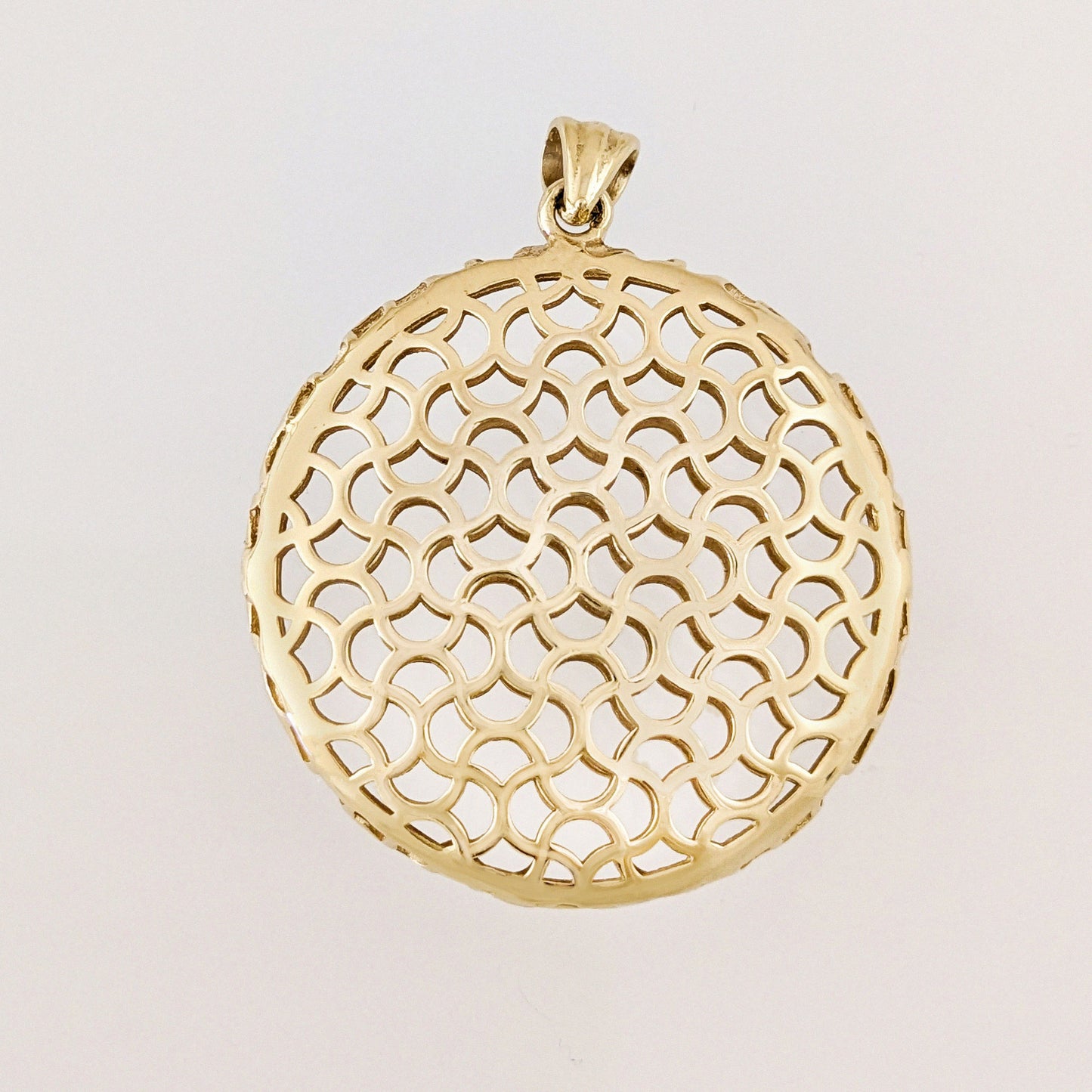 Ornate Round Openwork Pendant with Geometric Pattern