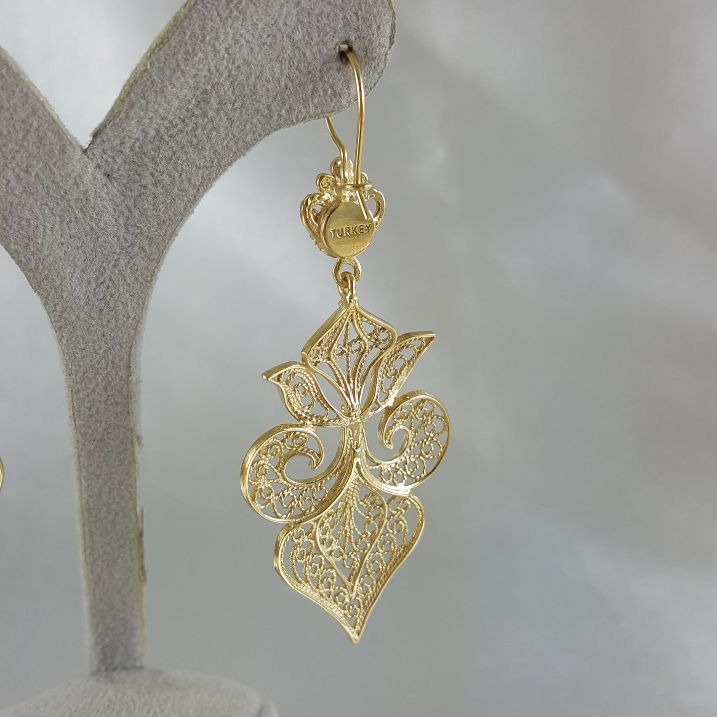 Gold Filigree Fleur de Lis Earring with Blue Gemstone