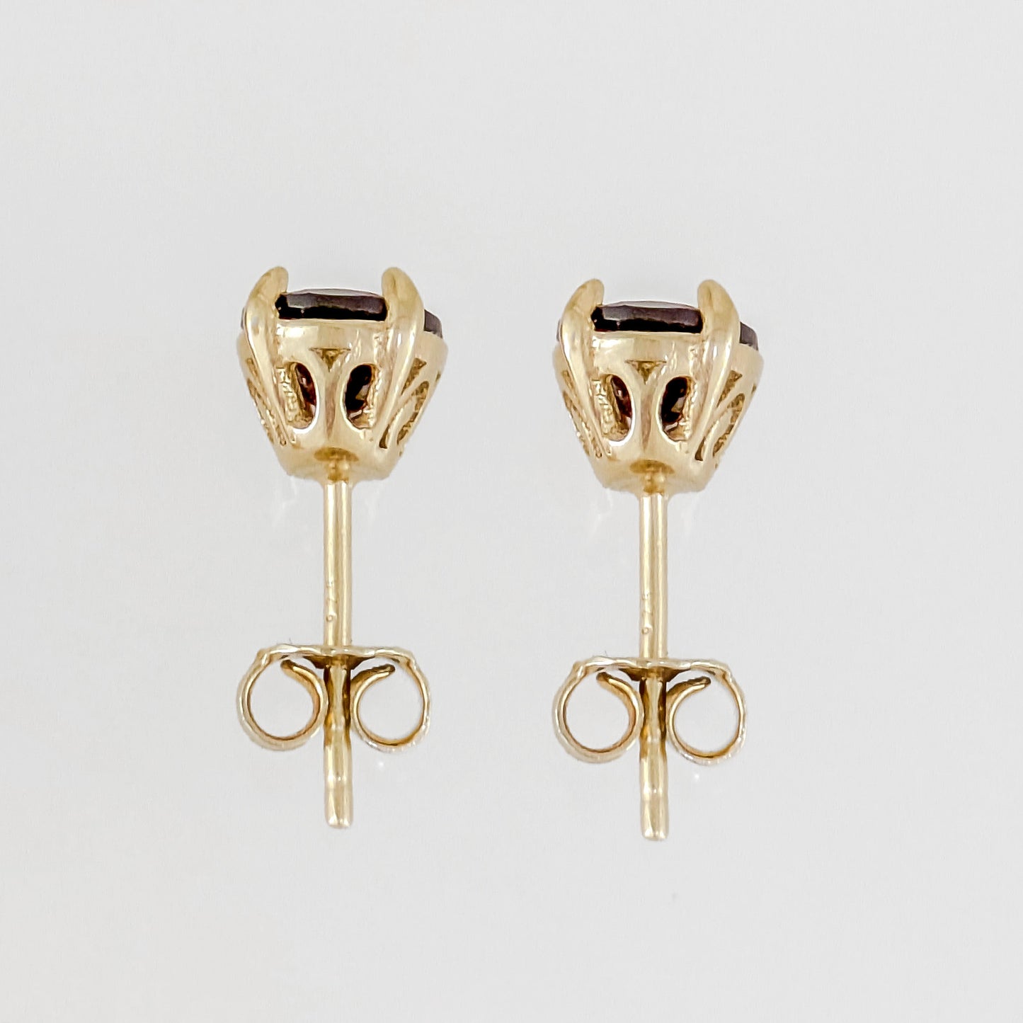 Oval Garnet Scrollwork Stud Earrings