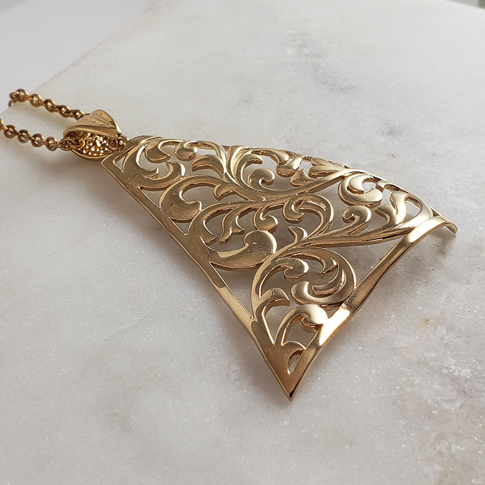 Charming Gold Scrollwork Statement Necklace