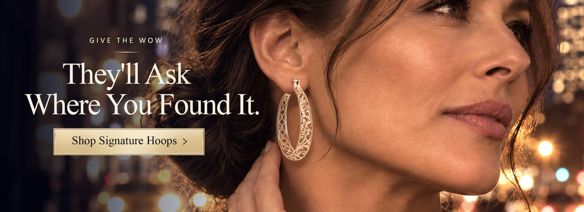 Model wearing gold filigree hoop earrings. Give the wow: they will ask where you found it. Shop signature hoops.