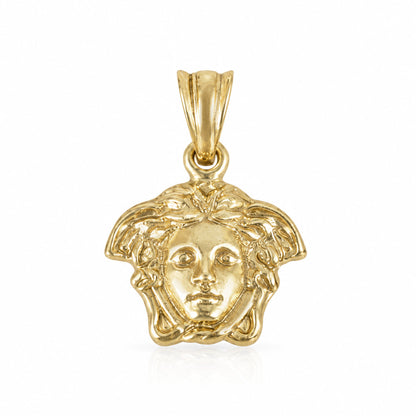 A gold pendant featuring a Medusa head design with detailed hair and a polished bail at the top, shown on a clean white background.