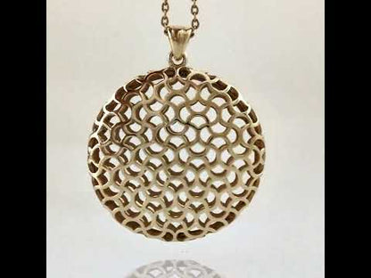 Ornate Round Openwork Pendant with Geometric Pattern