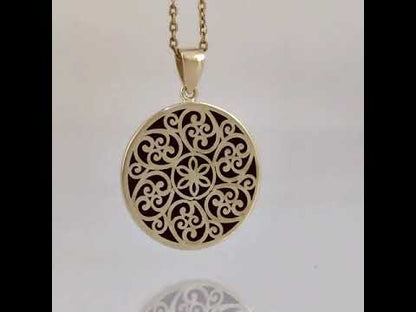 Round Openwork Scroll Pendant with Burgundy Enamel