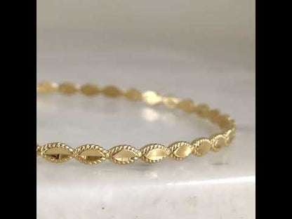 Textured Oval Link Bangle Bracelet with Sparkling Diamond Cut