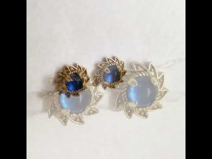 Blue Crystal Cabochon Stud Earrings with Ornate Sunburst Design
